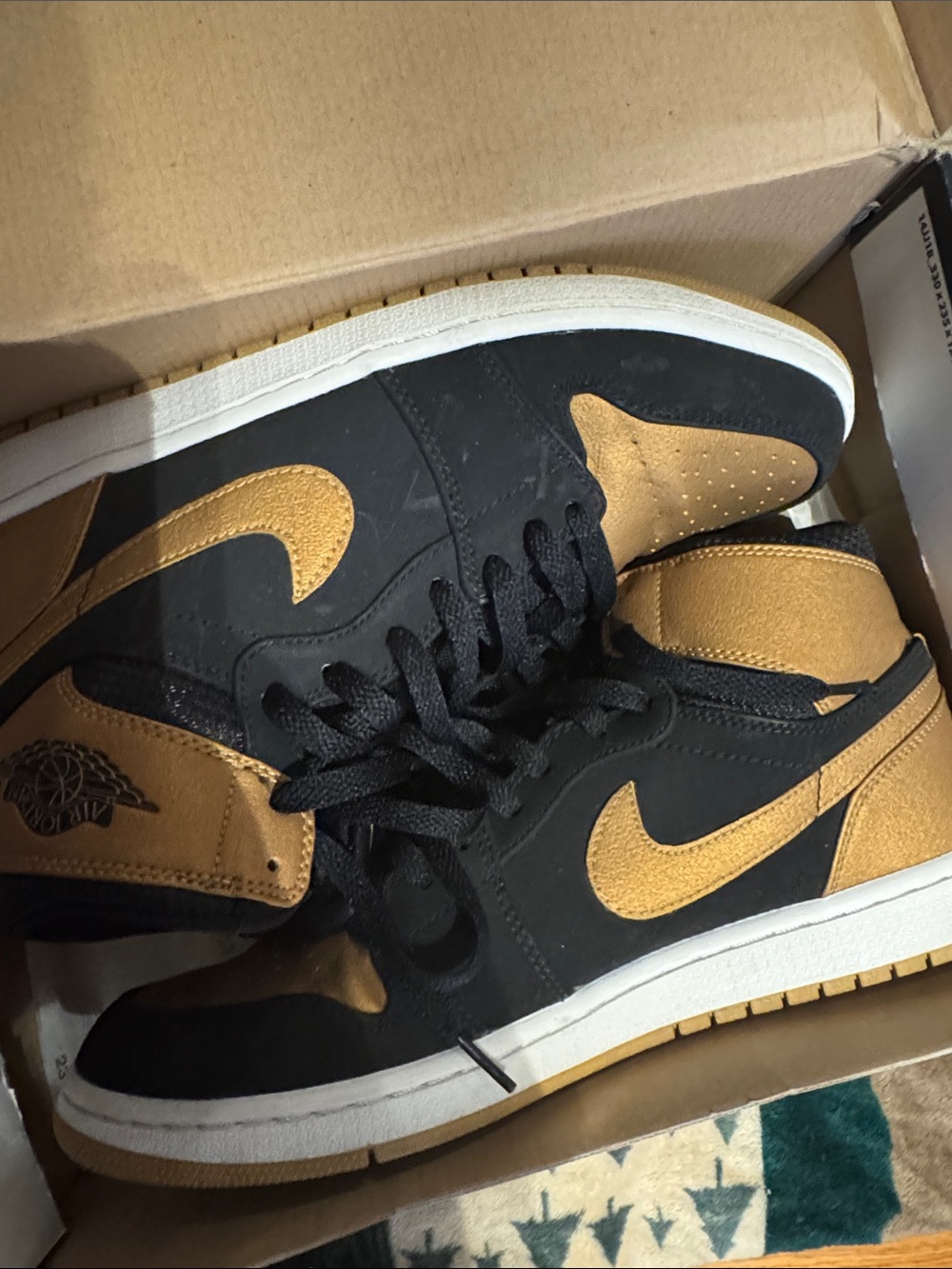 Nike Black and Gold High-Top Sneakers